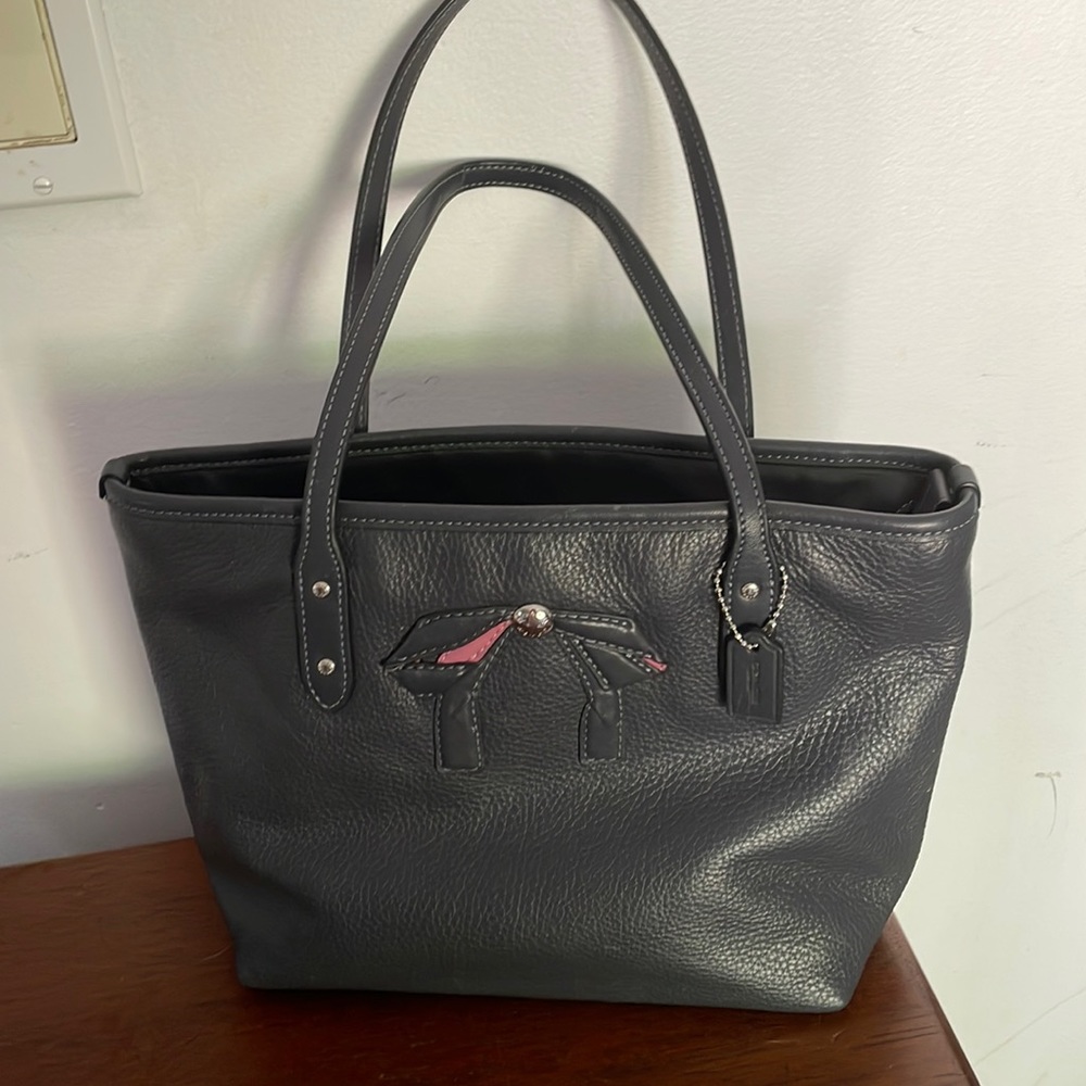 Navy blue small Coach bag… used one time… Super cute, supple leather.